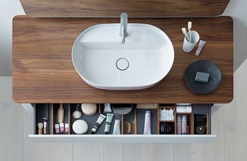 The handle-free drawers of Duravit's Luv freestanding bathroom unit by Danish designer Cecilie Manz provide plenty of storage space: they open via tip-on technology and close with self-closing action.