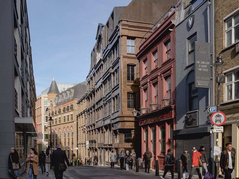 The extended building has a new facade inspired by long-gone buildings on the site.