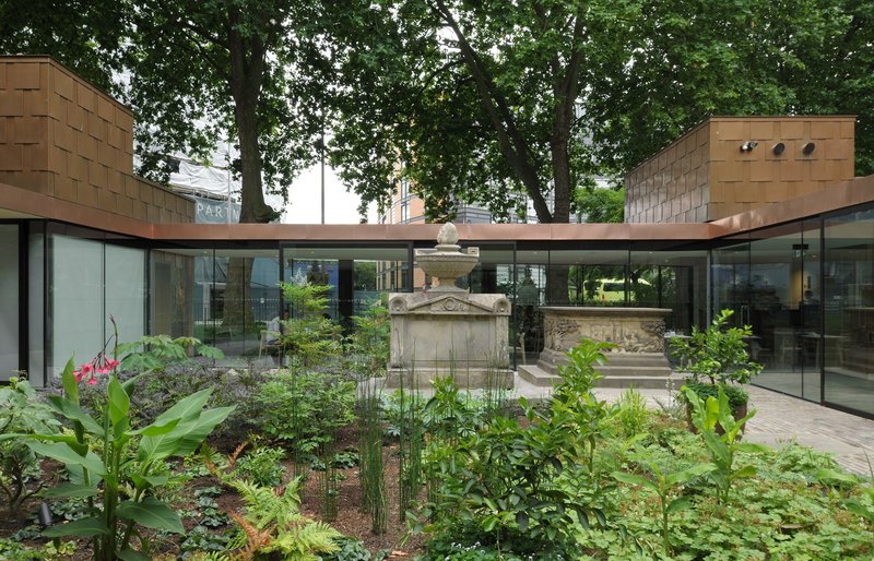 Pavilions, plants and tombs pushing up into and around the new cloister at the Garden Museum.