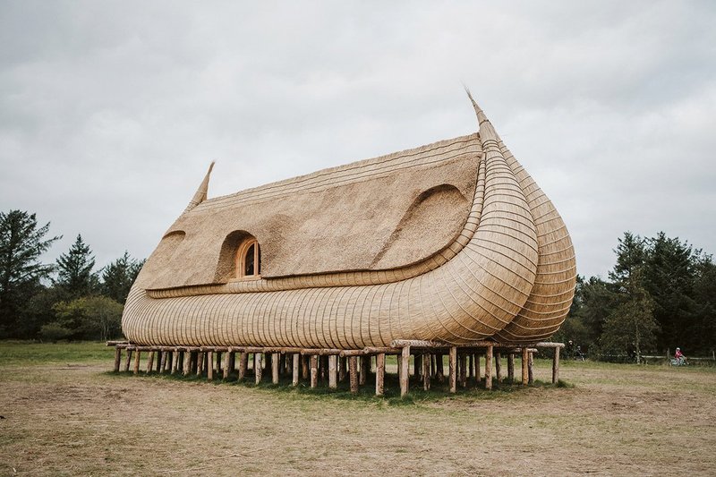The public artwork, looking like a boat in dry dock, is designed as a tourist draw. Top The Bolivian boatbuilders construct  long reed ‘chorizos’, the building blocks of the hull.
