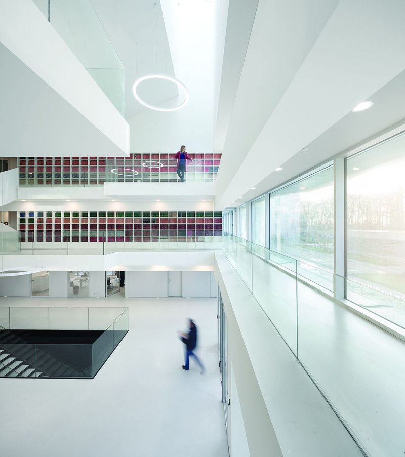 The library forms the focus of the atrium linking the circulation walkways.