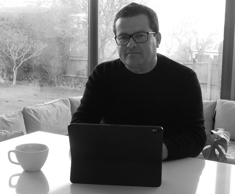 Ben Stephens of PASTE Architects, working from home in the kitchen-garden room extension he designed.