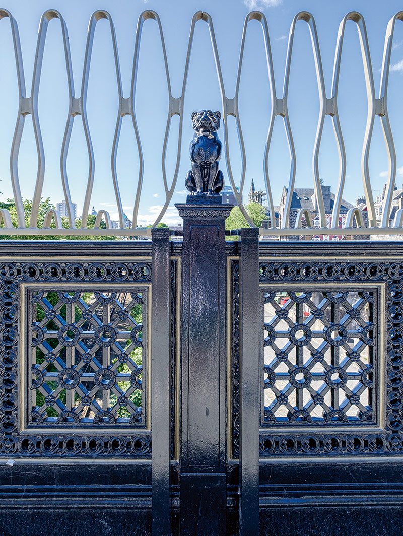 The new bronze powder-coated safety extension to the original railings across Union Bridge picks up themes from both old and new.