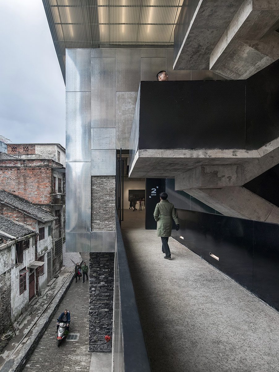 Lianzhou Museum of Photography Lianzhou China – open stairways above the narrow streets.