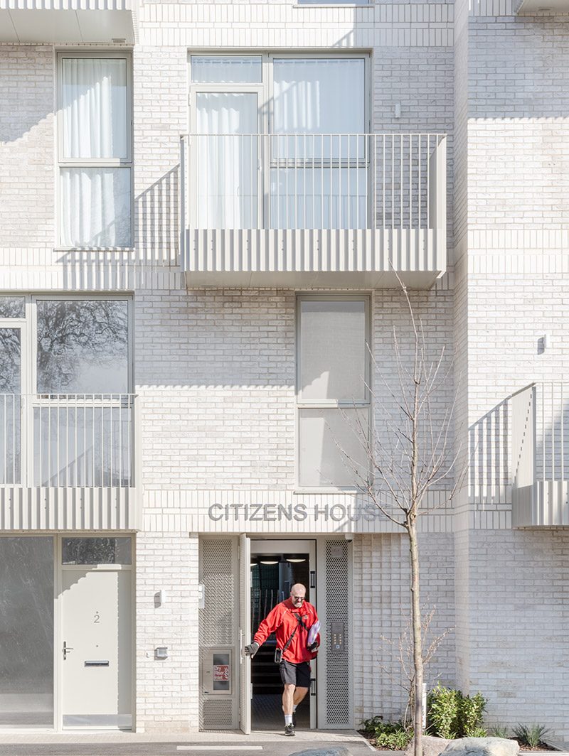 Brick detail adds interest to the entrance.