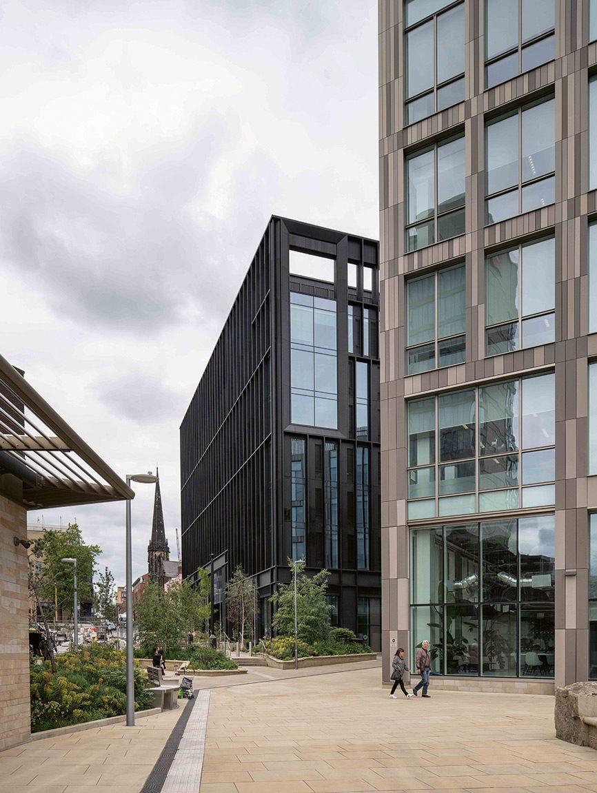The facade of the Elshaw House office building opens onto a new urban green space, Pound’s Park.