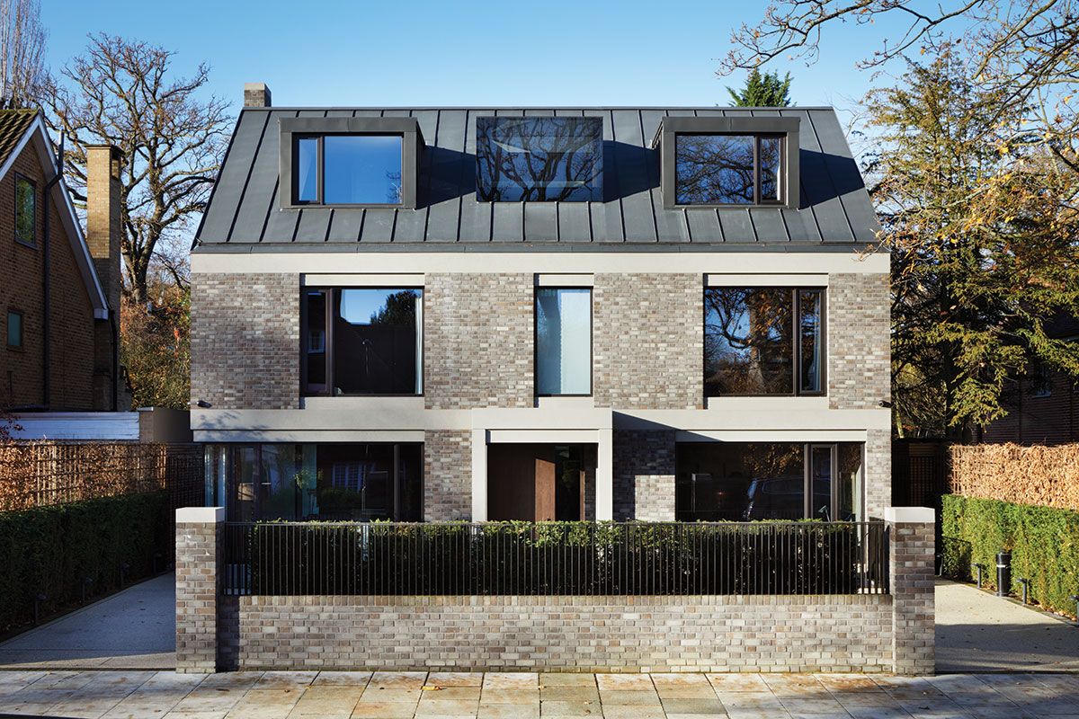 Kenwood Lee House’s slight street-side asymmetry fits with its Arts & Crafts neighbours.