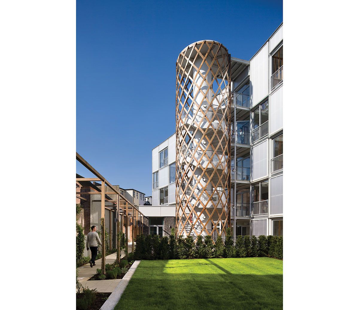 A small courtyard intercedes between public and private realms.