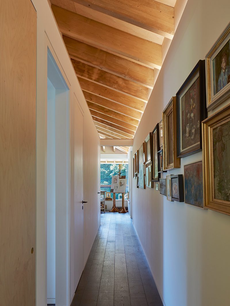 The corridor from the kitchen to the studio. Guest bedrooms come off to the left.