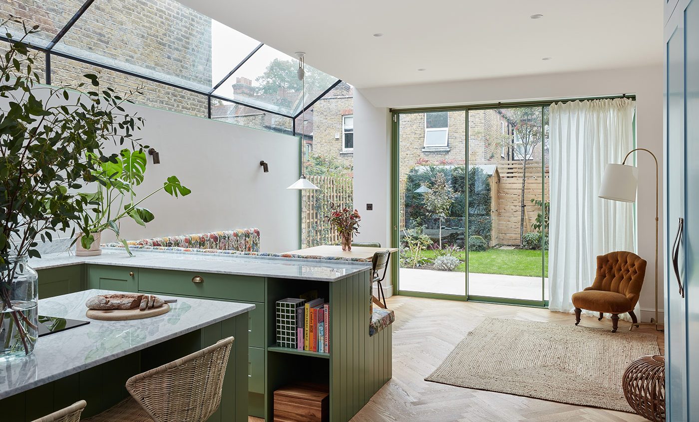 Maxlight sliding doors and up-and-over rooflight at Brockwell Garden in London by architect Studio Elephant and interior designer Lizzie Green.