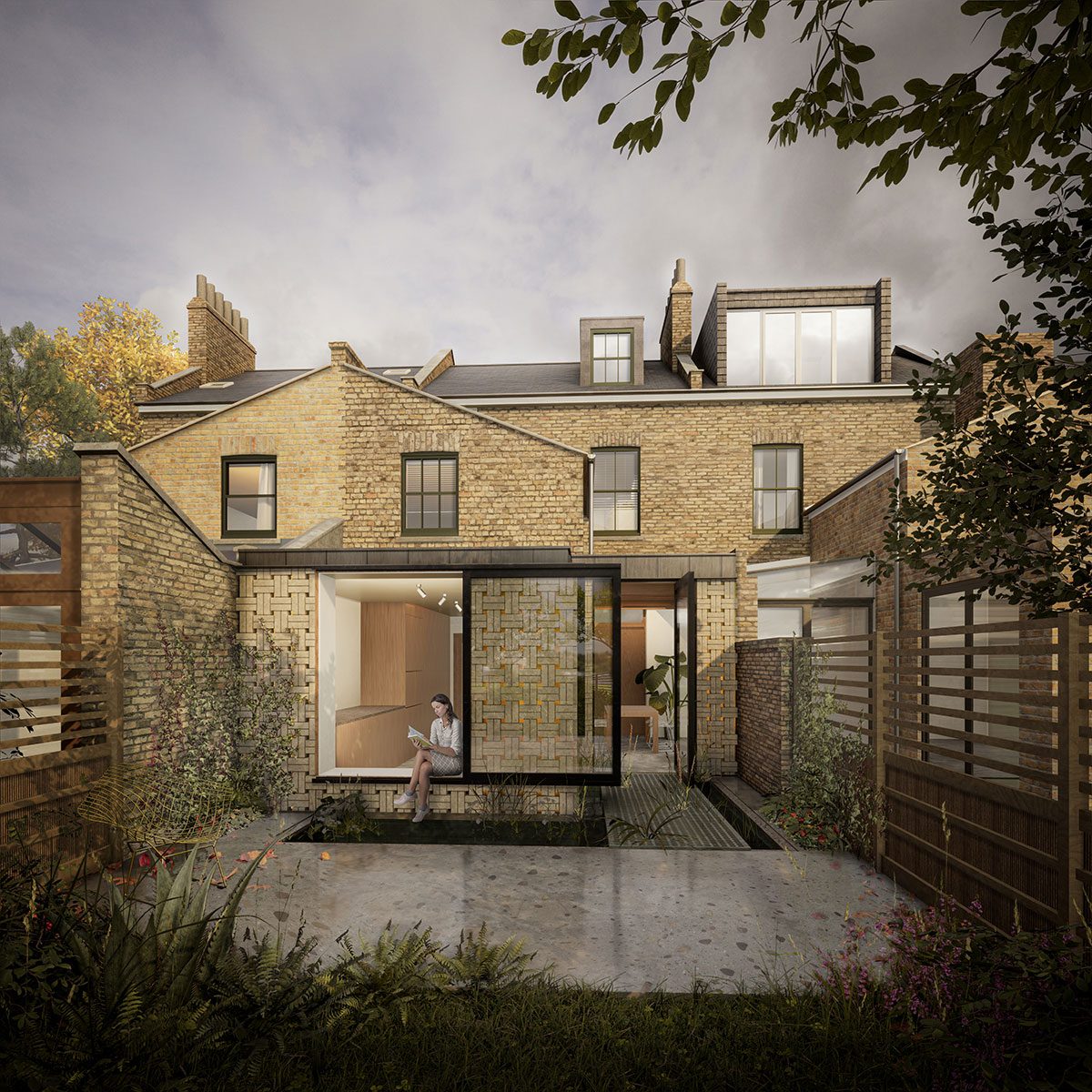 The basket weave pattern was conceived to break down the massing of the rear elevation.