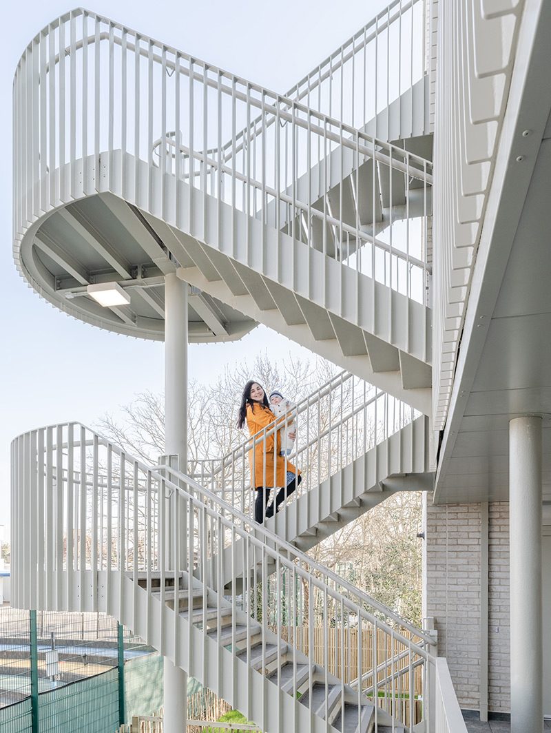 The architect envisages that deck access will seed friendships among residents.